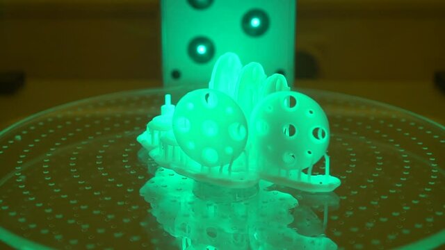 3D printing in CAD resin designed, cured with UV light, SLA, SLS, FDM printing techniques. Future technology