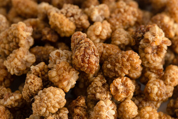 A Background of White Organic Dried Mulberries