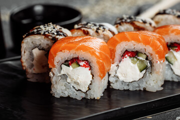 Sushi Philadelphia on a stone decorative plate