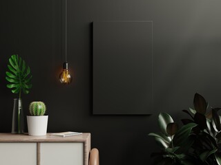 Mockup black poster in living room interior on empty dark wall background.