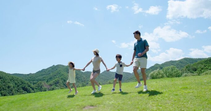 Happy Young Chinese Family Walking Outdoors,4K