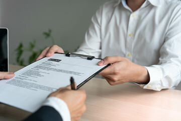 resume concept. Applicants send resumes to management prior to the commencement of the job interviews.