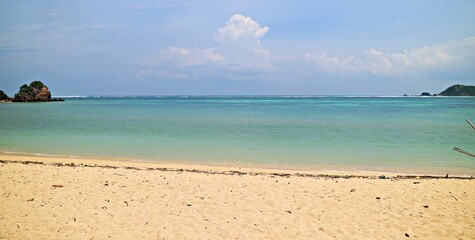 Fototapeta na wymiar exotic mandalika beach with white sand and islands. Become a favorite tourist destination on the island of Lombok, West Nusa Tenggara, Indonesia.