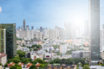 Fototapeta na wymiar Blur of Aerial view of many height buildings and condominium in Bangkok Backgrounds