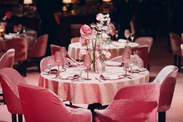 Romantic dinner pink decor table at restaurant.