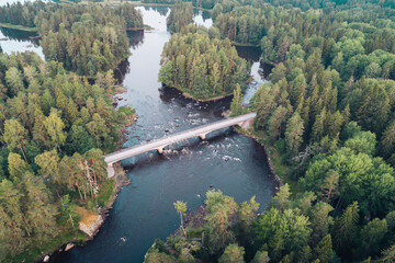 High angle aerial view of bridge connecting islands in a river landscape delta in Färnebofjärden national park
