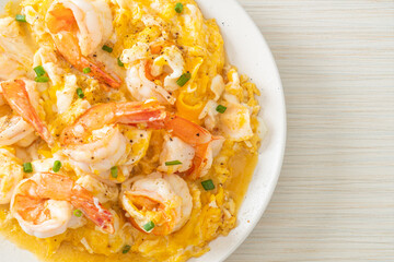 creamy omelet with shrimps or scrambled eggs and shrimps