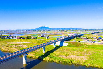 筑波山を背景に圏央道（常総インターチェンジ付近）を俯瞰撮影　鬼怒川　高速道路