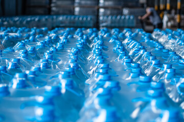 Packaged plastic water bottles in the finished product warehouse