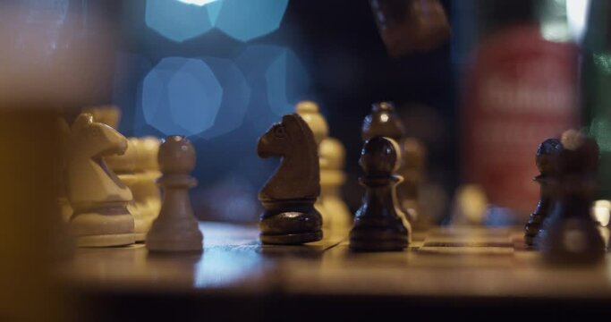 Playing chess at night - close-up footage