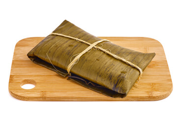 Comida típica mexicana, Tamales veracruzanos o jarochos, preparados con hojas de plátano, harina de maíz y adobo rojo. Alimento prehispánico. 