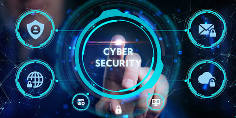 Fototapeta premium Cyber security data protection business technology privacy concept. Young businessman select the icon Cyber security on the virtual display.