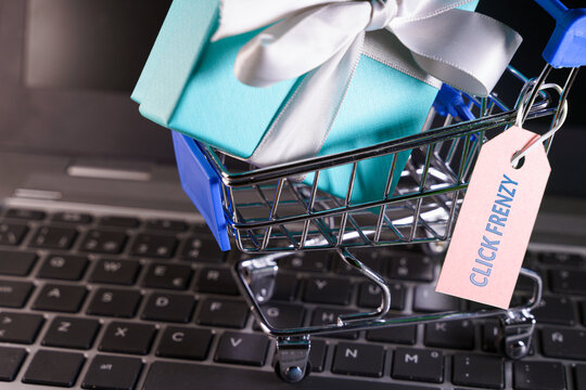 Small Shopping Cart With A Gift Inside And A Click Frenzy Tag