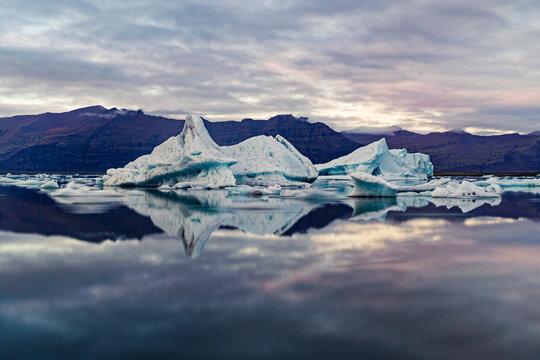 Iceberg broken off from the glacier of Jokulsarlon under the dramatic sky -- Iceland