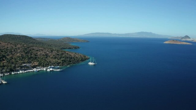 Amazing panoramic aerial 4k view from drone of beautiful bay of Bitez and Bodrum city in Bodrum on a bright and sunny day in Mugla province in Turkey