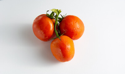 delicious Cherry tomatoes isolated over white background