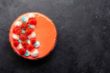 Birthday or holiday cake on a stone background