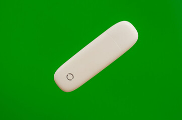 portable modem flash drive for computer and laptop on a green background