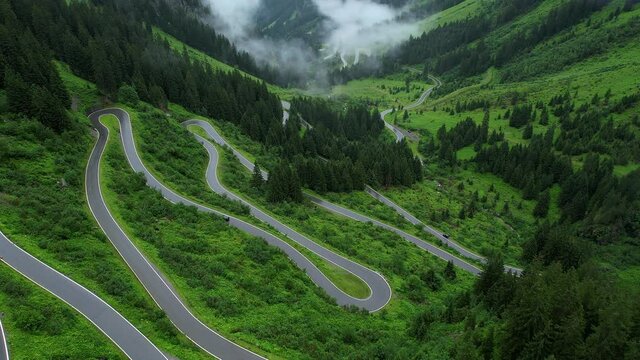 Bending streets at Silvretta High Alpine Road in Montafon Austria - travel photography by drone
