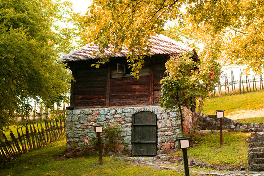 The traditional Serbian village Trsic - the most famous village in Serbia. Wooden ethno house in Trsic willage, memorial complex of Vuk Stefanovic Karadzic, cyrilic alphabet, born place, landscape.