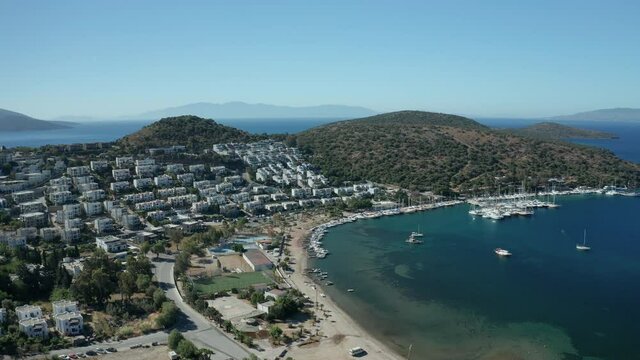 Amazing panoramic aerial 4k view from drone of beautiful bay of Bitez and Bodrum city in Bodrum on a bright and sunny day in Mugla province in Turkey