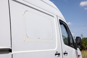 Side wall of a van with a marked area for a window