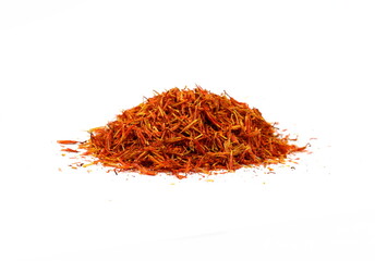 Saffron spice threads (strands) isolated on white background. Saffron sprinkle on white. Red spice...