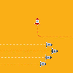 Think differently concept. Red rocket changing direction. New idea, change, trend, courage, creative solution, innovation and unique way concept.	
