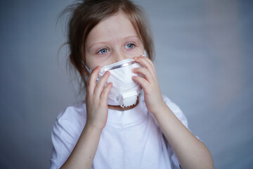 Girl choking in a mask, vaccinated, fighting the virus