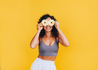 young black woman with flowers on her eyes