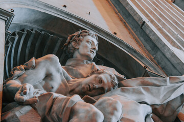 Low angle shot of tstatue of Saint John of God inside the St. Peter's Basilica in Vatican City