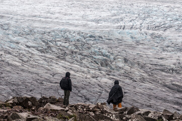 Hikers enjoying the view of the Vatnajokull National Park from a peak