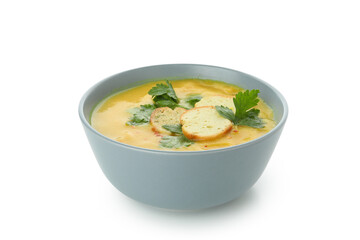 Plate of pumpkin soup isolated on white background