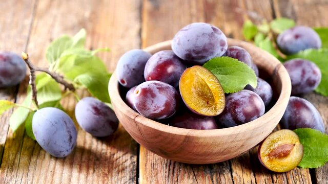 bowl of fresh blue plum