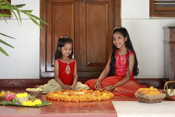 Onam pookalam making by kids