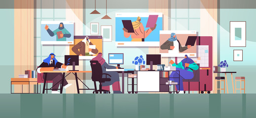 arab businesspeople discussing with colleagues in web browser windows during video call virtual conference
