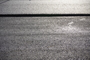Fototapeta premium Renewal of the road surface with new asphalt. Location: Hanover, Immelmannstrasse, Hanover, Germany