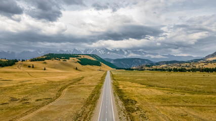 Chuisky tract. The most beautiful road in Russia, passes through the mountains and hills. Amazing view, beautiful sky. Altai Mountains, Russia