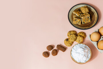 Ingredients for cooking on a pastel background

