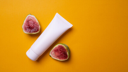 packaging of hand or face cream on yellow background