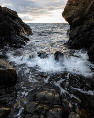 waves crashing on rocks at kullaberg nature reserve in south sweden