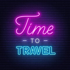 Time to travel neon lettering on brick wall background.