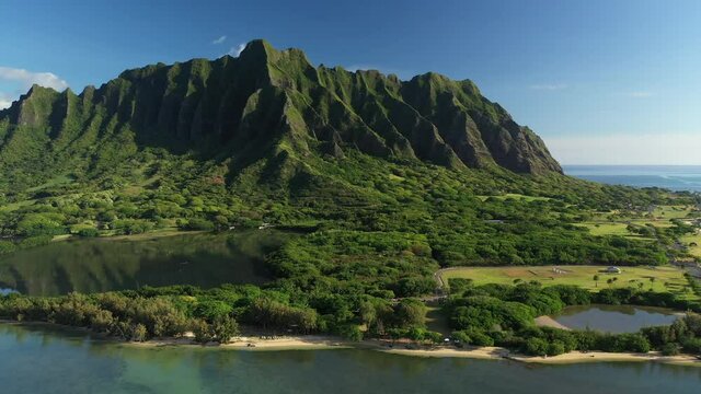 Aerial view of the ancient Moli'i fishponds with  reflections of the Koolau mountains in the ponds. The ponds are located near Kaneohe, on the island of Oahu, Hawaii, USA. 