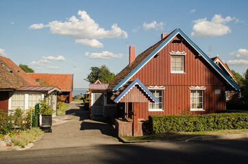 Beautiful wooden house in sunny summer day, Jodkrante, Lithuania.