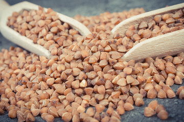 Heap of buckwheat containing vitamins and dietary fiber. Healthy nutrition