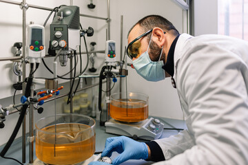 laboratory technician working with liquids