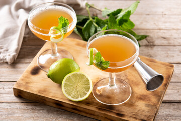 Old Cuban cocktail on wooden table.Alcoholic drink based on rum and champagne