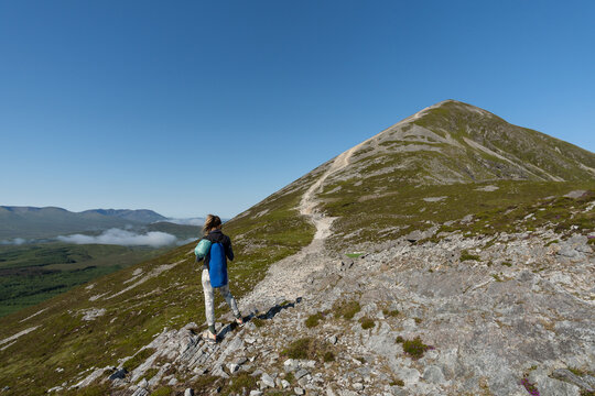 Woman climbing the Croagh Patrick mountain