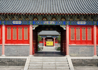 Foshan, Guangdong, China. Xi Qiao Mountain Guoyi Movie and TV City. Confucius garden. Wooden ornamented doors, the sample of  Lingnan architectural style. 