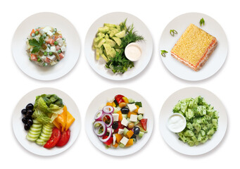 a set of different salads top view on a white background. It includes olivier salad, Greek salad, mimosa salad, fresh vegetable salad.